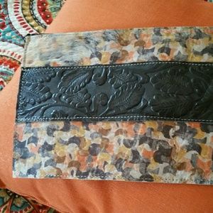 Cowhide zippered clutch
